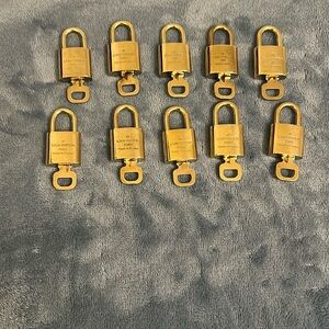 Louis Vuitton Gold Padlocks polished
